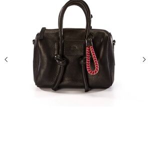 Argentinian designer Mecha Mendez, 100% leather crossbody handbag